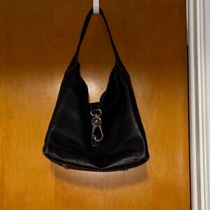 Dooney & Bourke Black Logo Lock purse .
